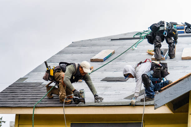 Professional Gutter Installation technician working in Norwich, VT